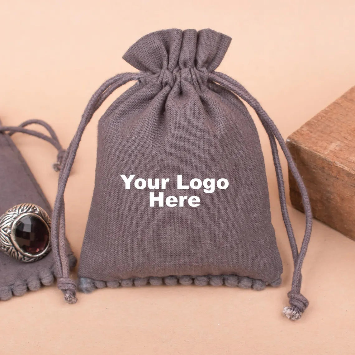 100 Personalized Brown Designer Pouch, Modern Elegance with bottom pom poms