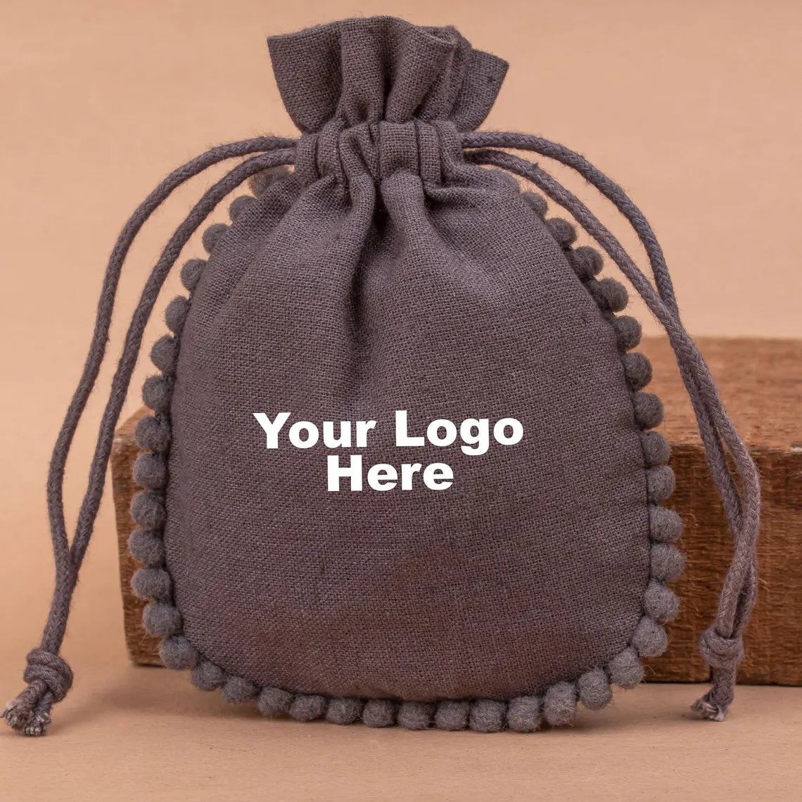 100 Charcoal Designer Pouch Handcrafted with Playful Pom Poms