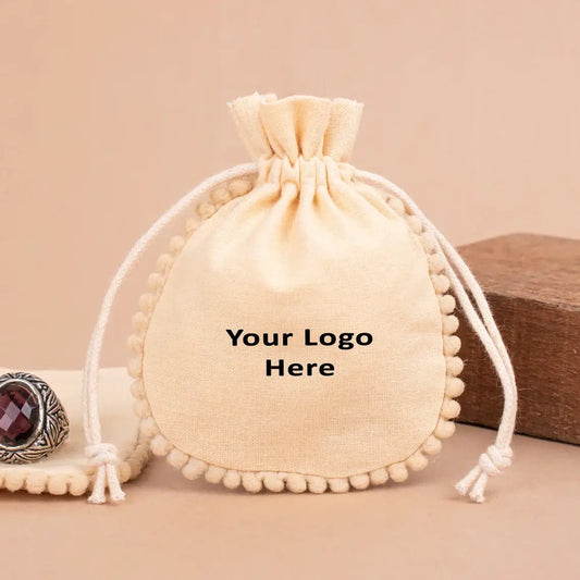 100 Personalized Off-White Designer Pouch A Touch of Natural Elegance with pom poms