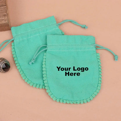 100 Vibrant Teal Designer Pouch: Accented with soft Pom Poms