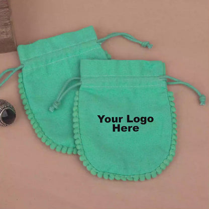 100 Vibrant Teal Designer Pouch: Accented with soft Pom Poms